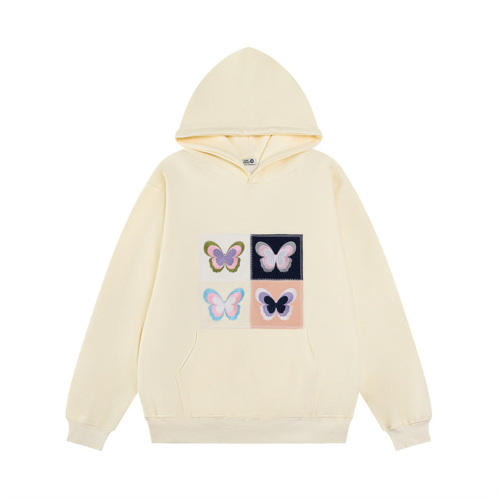 Hoodie med broderad fjärilsapplikation