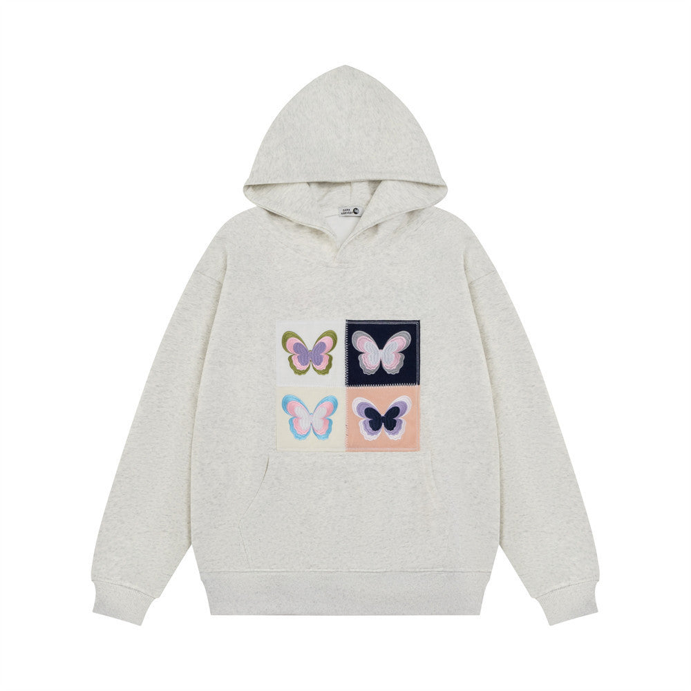 Hoodie med broderad fjärilsapplikation